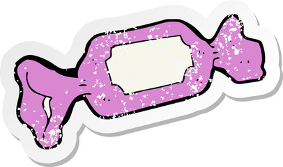 retro distressed sticker of a cartoon wrapped candy