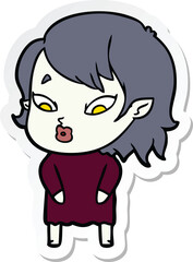 sticker of a cute cartoon vampire girl