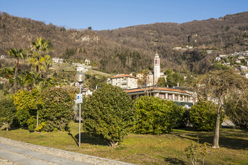 The park of Cannero with a beautiful church in background