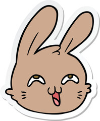 sticker of a cartoon happy rabbit face