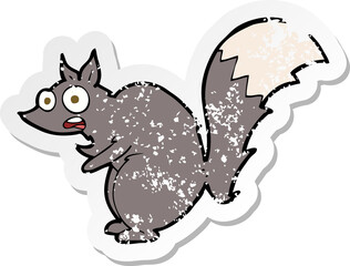 retro distressed sticker of a funny startled squirrel cartoon