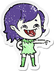 distressed sticker of a cartoon laughing vampire girl
