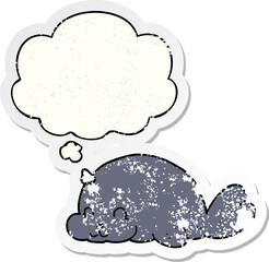 cute cartoon seal and thought bubble as a distressed worn sticker