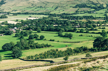 Fototapeta na wymiar Beautiful field view on Edale village and Mam Tor at Peak District National Park, England, UK. Staycation concept of traveling local