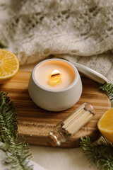 Fototapeta na wymiar Coconut or soy wax candle. Natural. Soft focus. Cozy