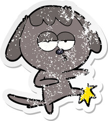 distressed sticker of a cartoon bored dog kicking leg