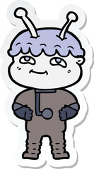 sticker of a friendly cartoon spaceman