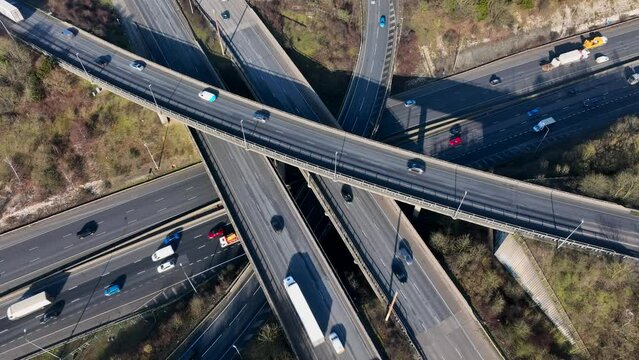 Rush Hour Vehicles Driving on a Motorway Interchange UK Aerial View
