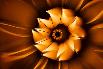 Abstract background with a tungsten lamp glowing in the dark