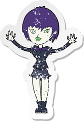 retro distressed sticker of a cartoon vampire girl