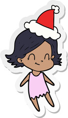 sticker cartoon of a friendly girl wearing santa hat