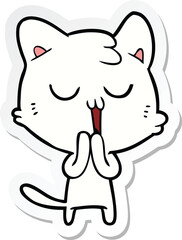 sticker of a cartoon cat singing