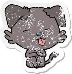 distressed sticker of a cartoon dog sticking out tongue