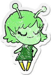 distressed sticker of a smiling alien girl cartoon