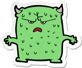 sticker of a cartoon little alien