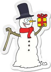 sticker of a cartoon snowman holding present