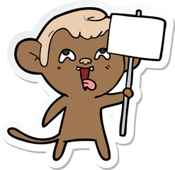 sticker of a crazy cartoon monkey with sign