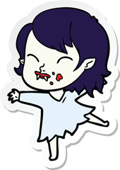sticker of a cartoon vampire girl with blood on cheek