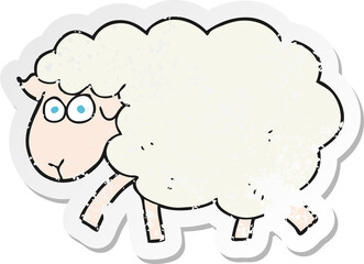 Obraz premium retro distressed sticker of a cartoon sheep