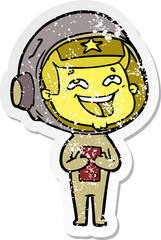 distressed sticker of a cartoon laughing astronaut