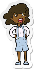 sticker of a cartoon woman in dungarees