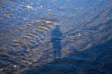 Sombra do fotografo na agua