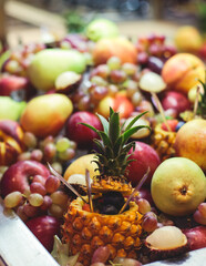 Beautifully decorated banquet catering table with variety of different food snacks, sandwiches, croissants and appetizers on a party event or celebration, delicatessen setting, coffee break