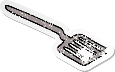 distressed sticker of a quirky hand drawn cartoon spatula