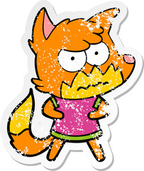 distressed sticker of a cartoon annoyed fox