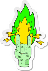 sticker of a cartoon zombie hand making horn sign