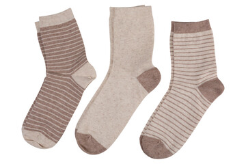 Three pairs of socks, with and without stripes, in a row, on a white background, isolate