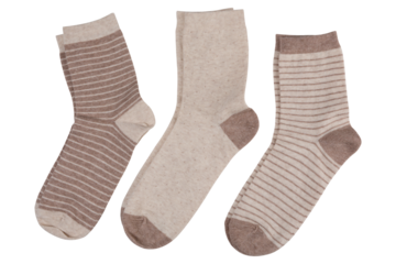 Three pairs of socks, with and without stripes, in a row, on a white background, isolate