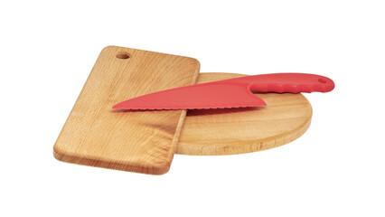 red plastic knife lies on wooden cutting boards