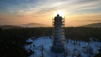 Aerial view of Wielka Sowa (Great Owl) during sunset - highest peak of the Owl Mountains in Central...