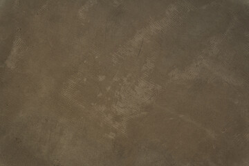 Brown concrete texture. Stone wall background. Surface of the concrete old floor in scratches. High...