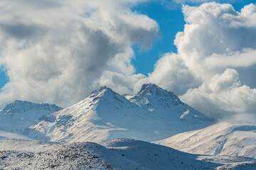 Fototapeta na wymiar Beautiful snow covered mountains. Armenia Aragats. 