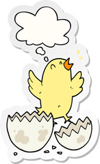 cartoon bird hatching from egg and thought bubble as a printed sticker