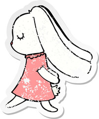 distressed sticker of a cute cartoon rabbit