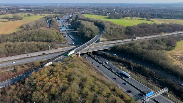 M1 and M25 UK Motorway Interchange Rush Hour Aerial View