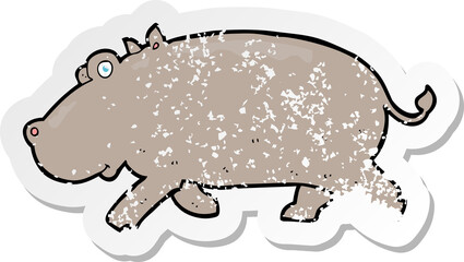 retro distressed sticker of a cartoon hippopotamus