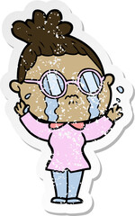 distressed sticker of a cartoon crying woman wearing spectacles