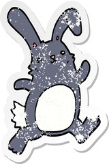 distressed sticker of a cartoon rabbit running