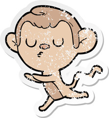 distressed sticker of a cartoon monkey