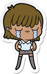 sticker of a cartoon woman crying