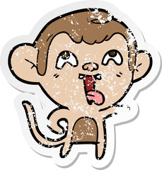 distressed sticker of a crazy cartoon monkey