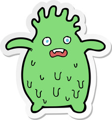 sticker of a cartoon funny slime monster