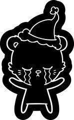 crying cartoon icon of a polarbear wearing santa hat