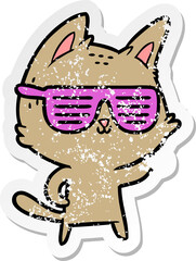 distressed sticker of a cartoon cat wearing cool glasses