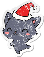 christmas distressed sticker cartoon of kawaii cat