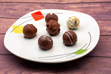 Chocolate truffles filled with brandy, coffee iris, rum, kirsch, pisco and curacao